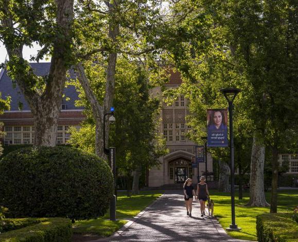 people walking around beautiful campus